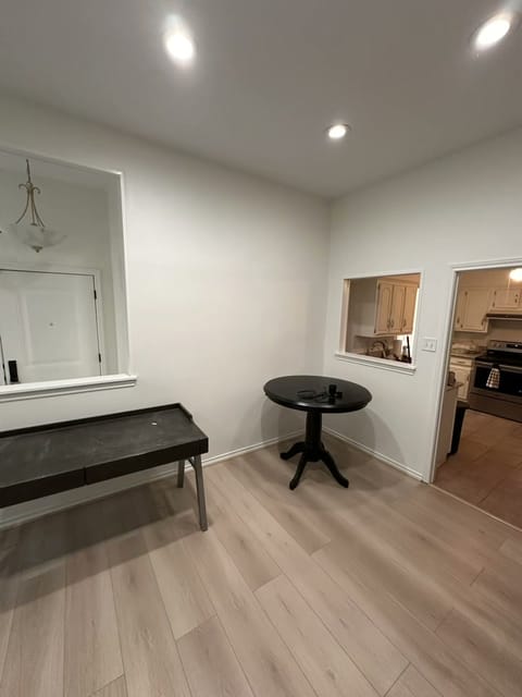 The same space finished with new flooring, paint and built-ins
