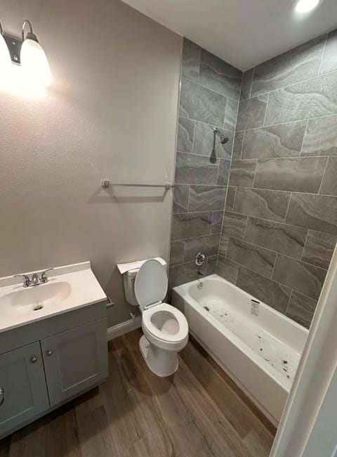 Floor to ceiling tiled shower