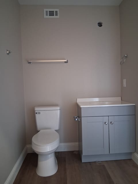 Finished bathroom with new vanity and flooring
