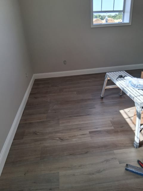 New plank flooring installed in a new home build